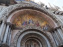 A mosaic above a door into St Mark's Basilica